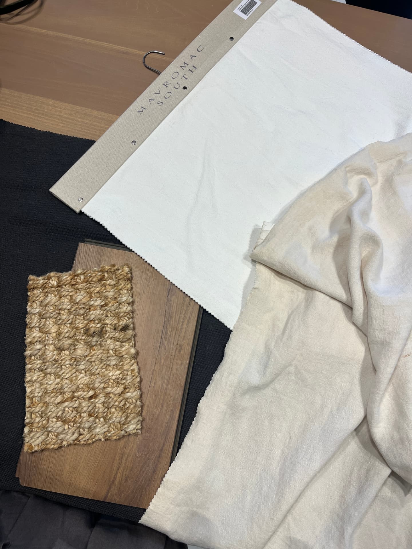 Natural linen and cotton fabric samples with jute weave and oak veneer